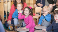 Rosenberg preschool kids playing drums.