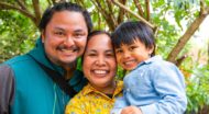 Smiling family with preschool child